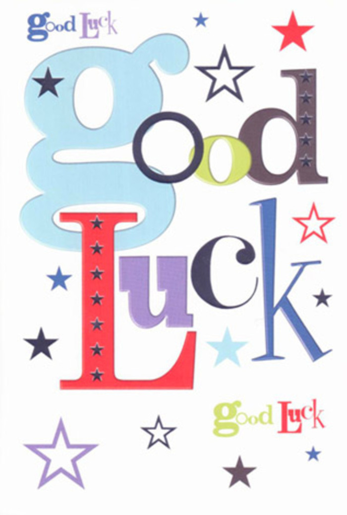 A bright, celebratory good luck card fills the image, styled with the same joyful precision a florist might use when finishing a hand-tied bouquet at Belmont Florist. The background is a fresh, unblemished white, as clean as new paper on a design table, making the colourful typography at the centre leap forward. The phrase Good Luck is spelled out in a sequence of large, mismatched letters-some stout and blocky, others tall and slender, a few whimsically curved-each one rendered in a distinct tone: pastel blue, brick red, leafy green, deep navy, and royal purple. This lively variation creates a sense of movement, as though the words themselves are cheering. Around them, countless small stars are scattered like petals tossed along a Belmont side street after a celebration, rendered in gradients of indigo, midnight blue, sky blue, lavender, and soft lilac, with occasional hints of lime and teal that add a citrus-bright lift. Some stars are bold and crisp, while others are faint and almost translucent, giving the impression of depth and distance, like a night sky receding over rooftops. The printing is flat yet visually tactile; you can imagine the smooth, cool feel of the thick card when you run your fingers across the surface, appreciating the subtle resistance of quality cardstock. The overall effect is modern but heartfelt-a design that would slip easily into a bouquet being delivered for a new job in a Belmont office, a university send-off, or the first night of a show at a nearby community hall. It radiates an easy, genuine encouragement, a visual promise that someone took the time to choose a card that feels as thoughtful as the flowers beside it.