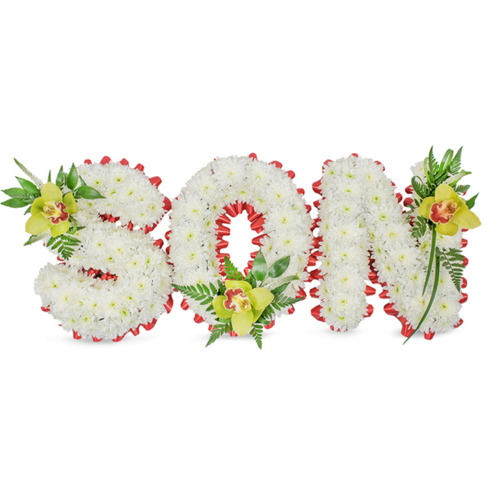 Crafted with quiet precision, this three-dimensional floral tribute spells out SON in bold block letters entirely covered in dense, immaculate white chrysanthemum blossoms. Each letter's sculpted face is soft and uniform, while the edges are given a refined, scalloped character by a continuous red ribbon folded into small loops that trace the perimeter and the inner curve of the O. The contrast between the pristine white chrysanthemums and the vivid red ribbon is clean and striking, lending the piece a solemn dignity that reads clearly from a distance and up close.

Accenting the composition are three lime-green Cymbidium orchids-each with delicate pale orange to reddish-brown markings in the throat-placed strategically: high on the S, cradled in the O, and rising on the upper right of the N. These orchids offer a waxy texture and a subtle perfume that complements the chrysanthemums' muted scent. Surrounding the orchids, slender green leaves and fine fern fronds extend upwards and outwards, adding height, movement, and a natural frame to the letters. Presented against a plain white background, the design's craftsmanship is foregrounded: the tidy petal placement, the careful looping of the ribbon, and the thoughtful interplay of textures and tones. As a local Belmont florist I take pride in arranging memorial pieces with this level of care-Belmont Florist often creates similar tributes for services near Belmont Village, community chapels, and quiet graveside remembrances-so families can see how colour, form, and texture combine to express love and enduring remembrance.