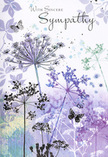 This sympathy card reads like a gentle visual poem, its composition built from airy silhouettes of wildflowers rising in slender arcs against a tranquil palette of lavender, indigo, and softened blue. The stems are fine and slightly curved, topped with intricate umbel-shaped blooms that almost seem to float, as though caught in a faint breeze that might drift across Belmont's residential gardens at dusk. Layers of colour-muted purples, silvery greens, and misty blues-wash softly across the background, suggesting distant foliage and a sky settling into evening. There is a dreamlike quality to the scene: petals and leaf forms appear and fade, their edges blurred just enough to feel like memories coming gently to the surface. Butterflies, rendered with translucent wings and the lightest touch of outline, hover close to the blossoms, invoking transformation, presence, and the idea that love continues beyond what we can see. Across this calming backdrop, simple, sincere condolence text is placed with care, its understated script complementing the fragile elegance of the flowers rather than competing with them. The whole design feels cool yet consoling, like a deep breath taken on a quiet side street in Belmont after a long, emotional day. As a florist who often delivers sympathy flowers to local homes and chapels, I sense how this card offers a respectful, tender embrace-unassuming, nature-led, and deeply attuned to the need for solace when someone is facing loss.